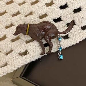 Pooping Dog Brooch with Blue Accents